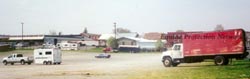 Parking lot of New Holland Sales Stables. 